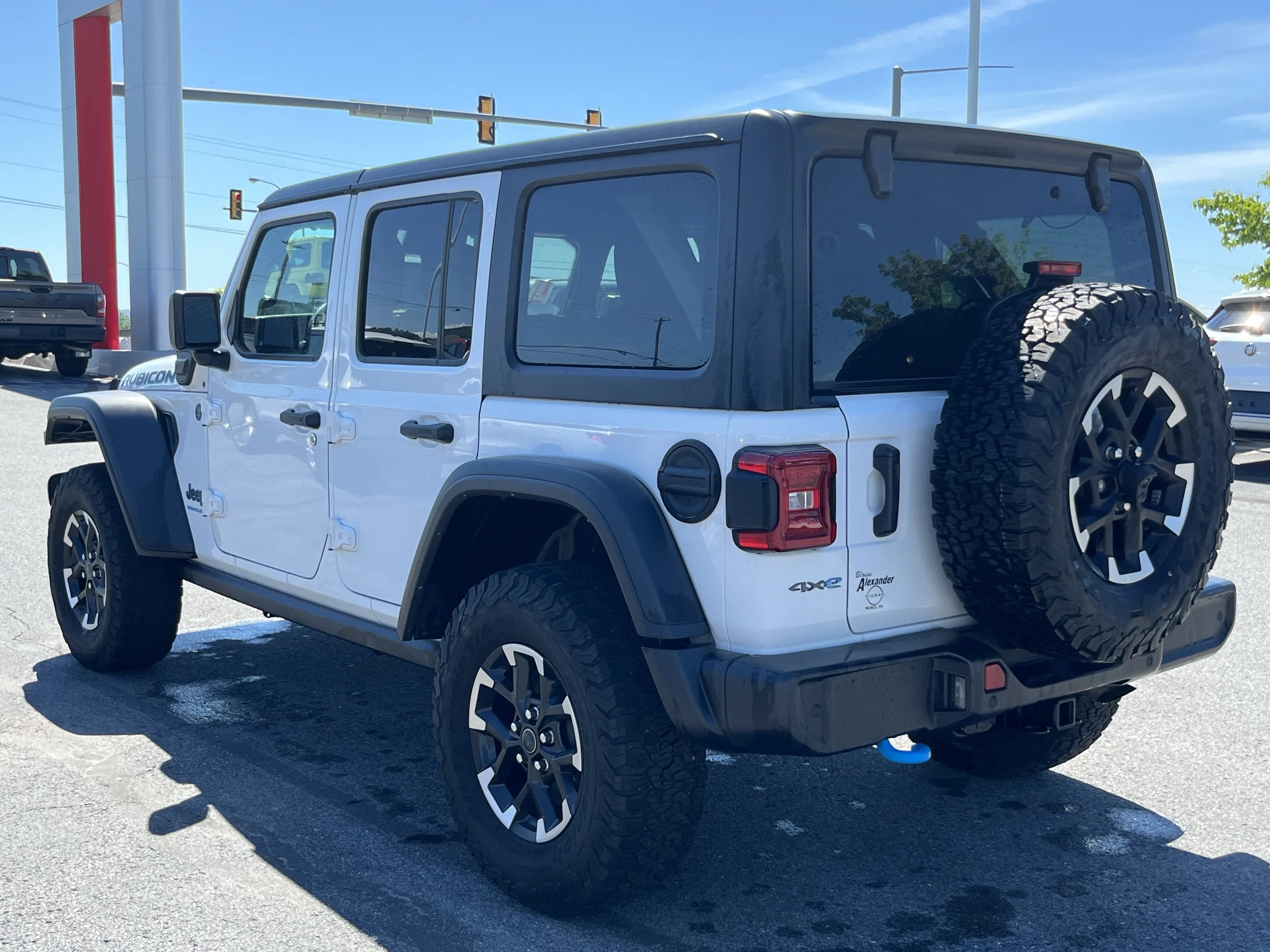 Used 2024 Bright White Clearcoat Jeep Rubicon 4xe image 7