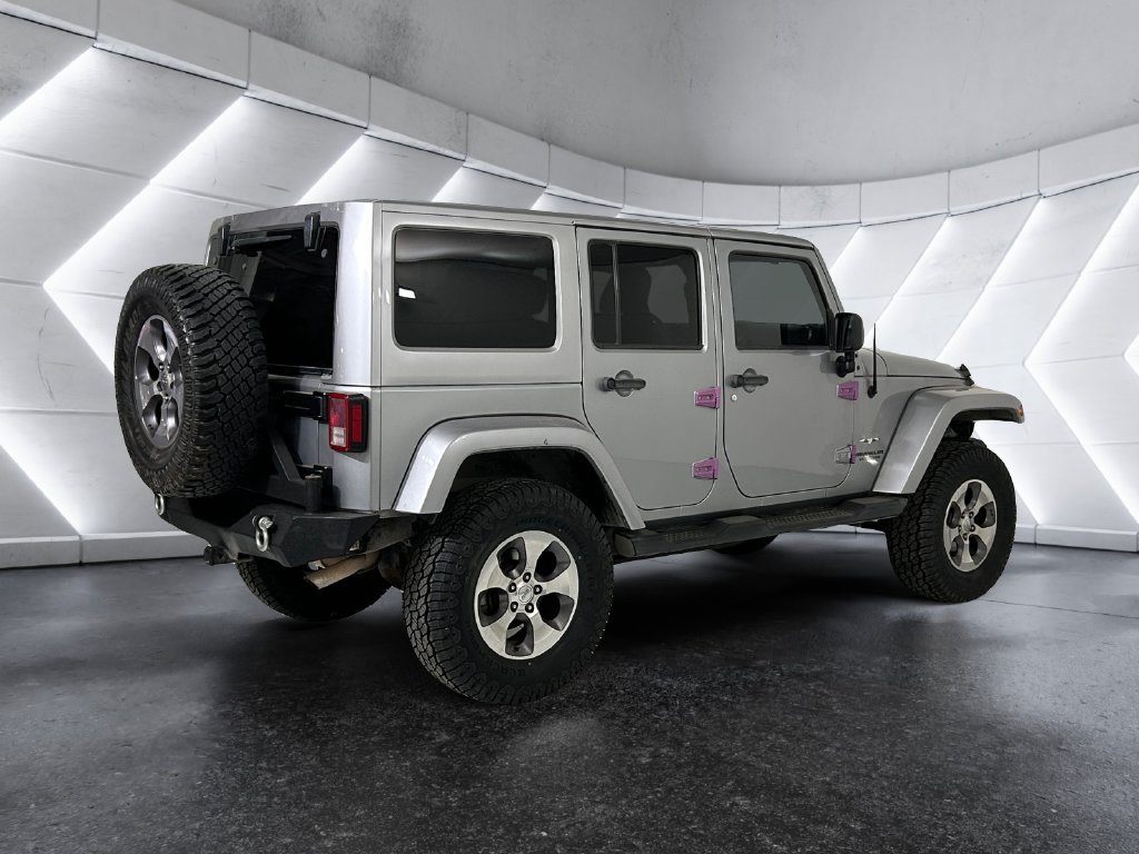 Used 2016 Silver Jeep Unlimited Sahara image 4
