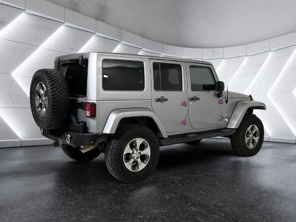 Used 2016 Silver Jeep Unlimited Sahara image 4