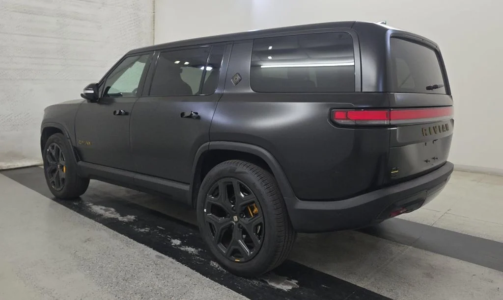Used 2024 Black Rivian Adventure image 2