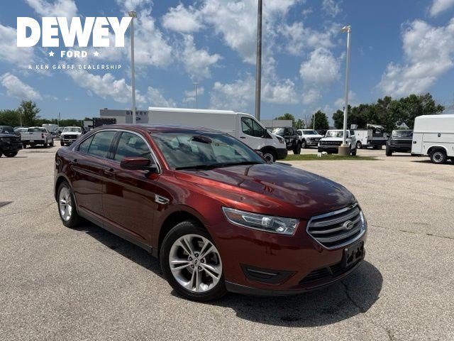 Used 2016 Maroon Ford SEL image 1