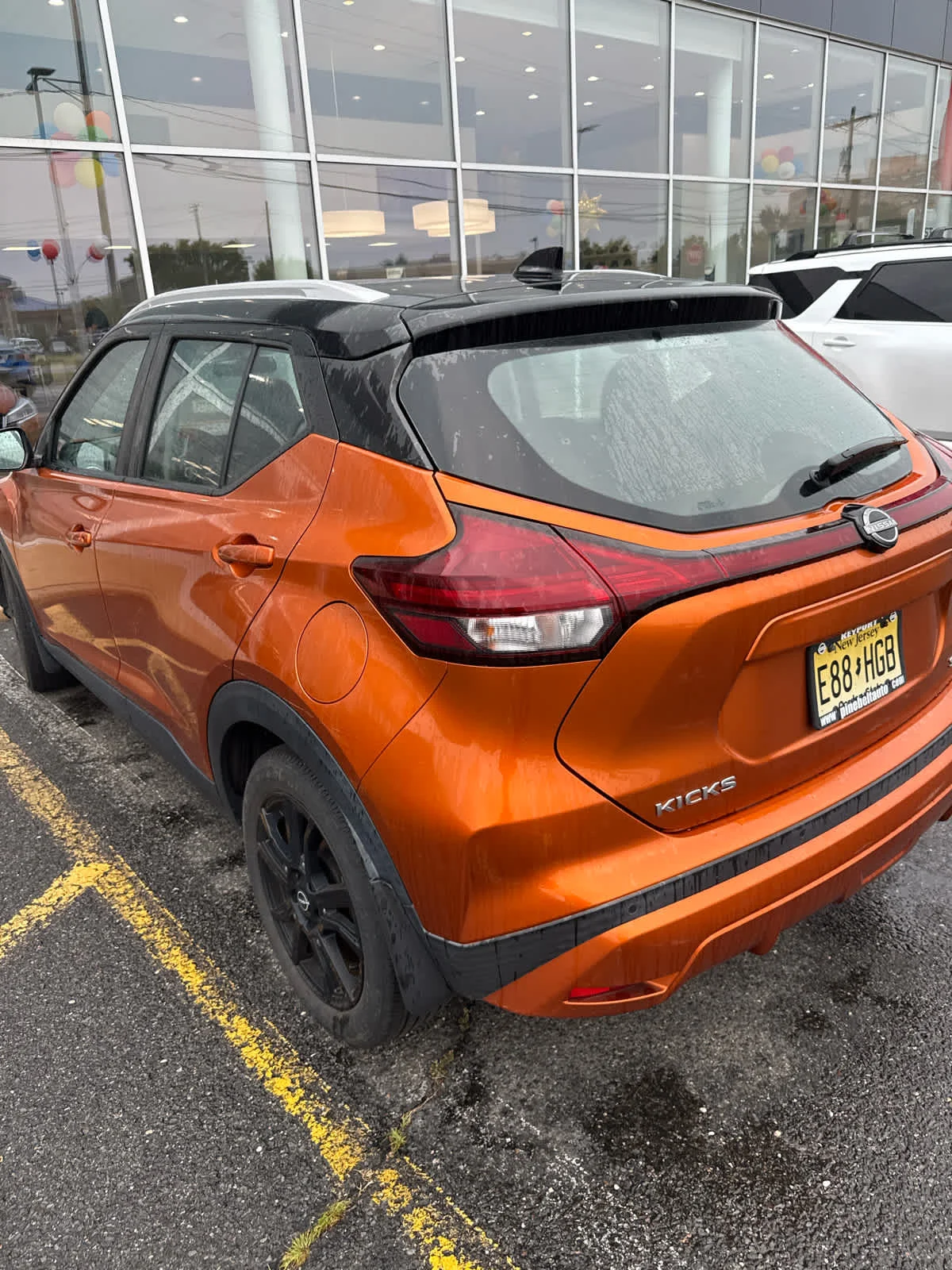 Used 2022 Monarch Orange Metallic/Super Black Nissan SV image 7