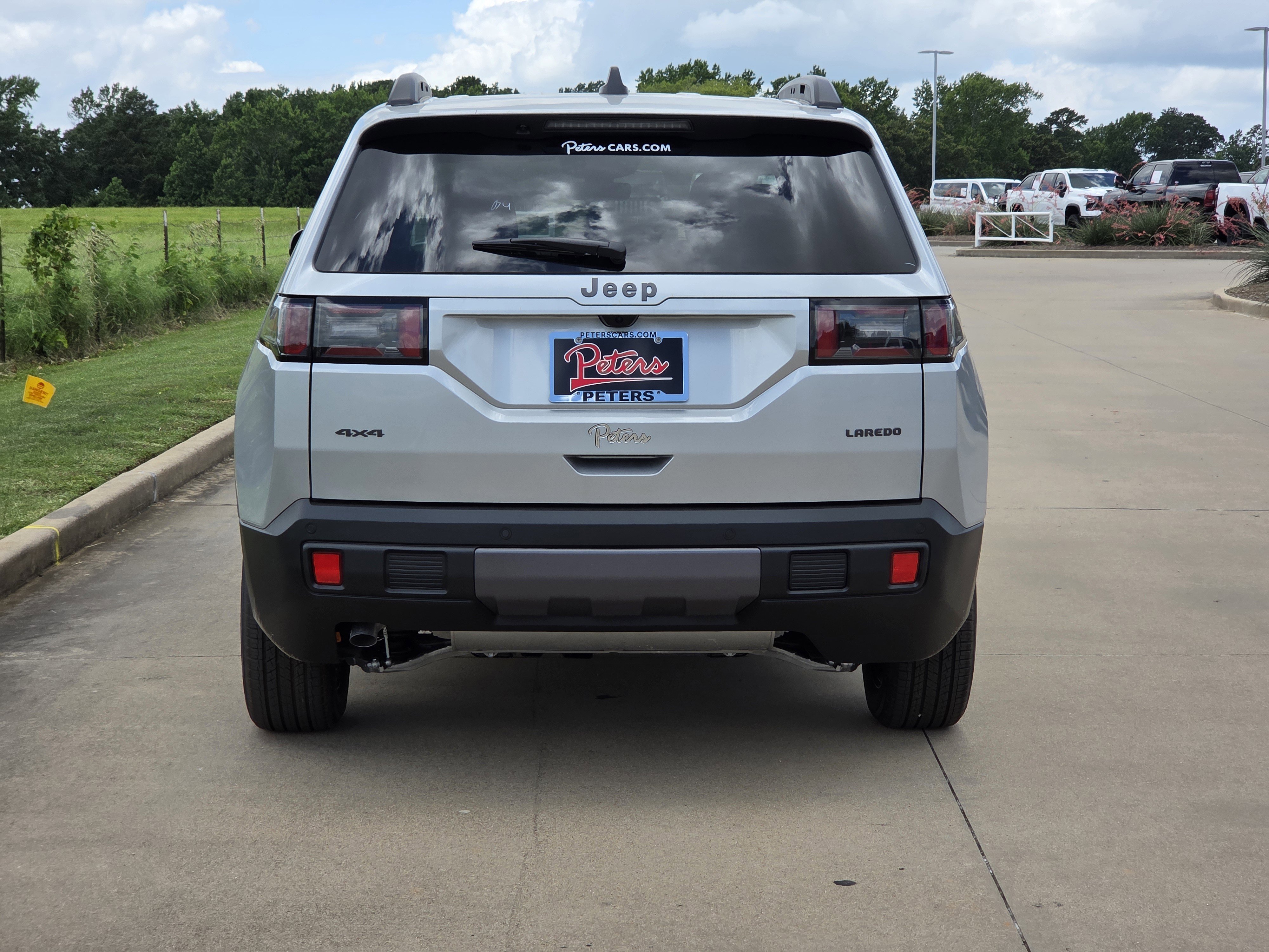 New 2026 Silver Zynith Clearcoat Jeep Laredo image 4