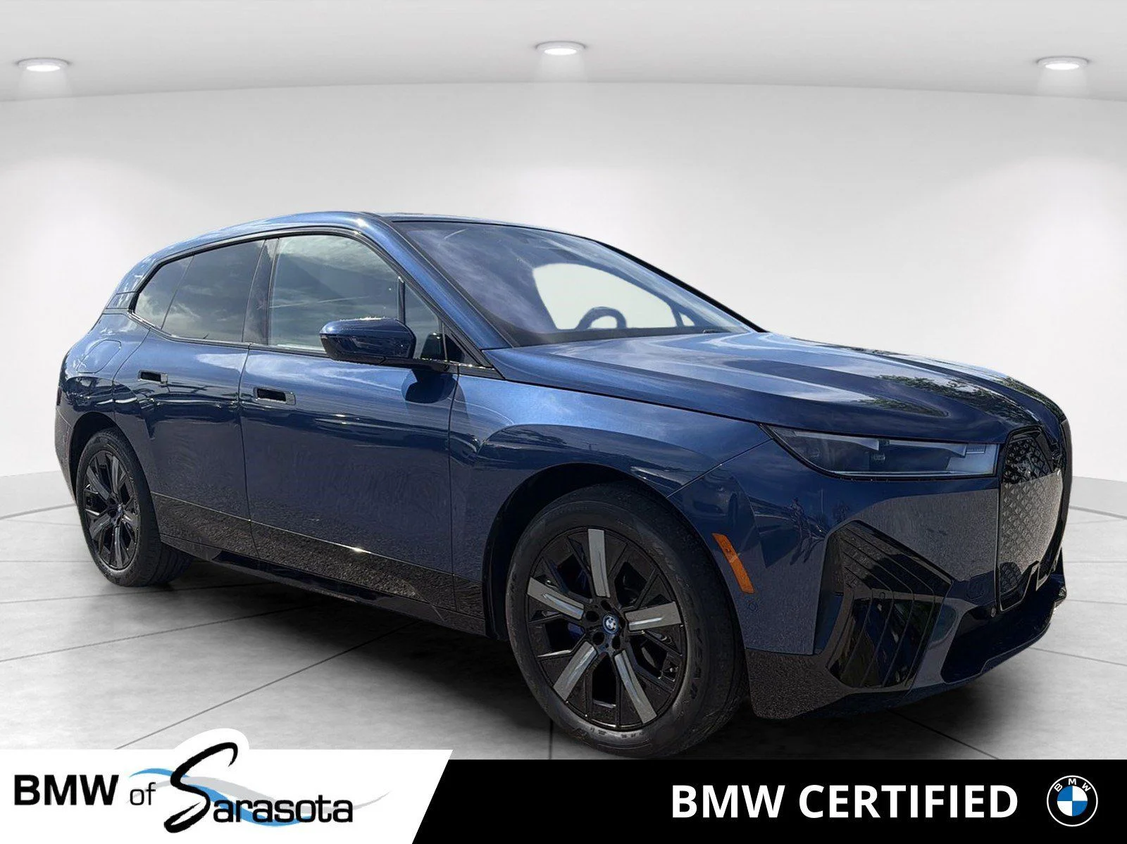Certified Used 2024 Blue BMW xDrive50 image 1