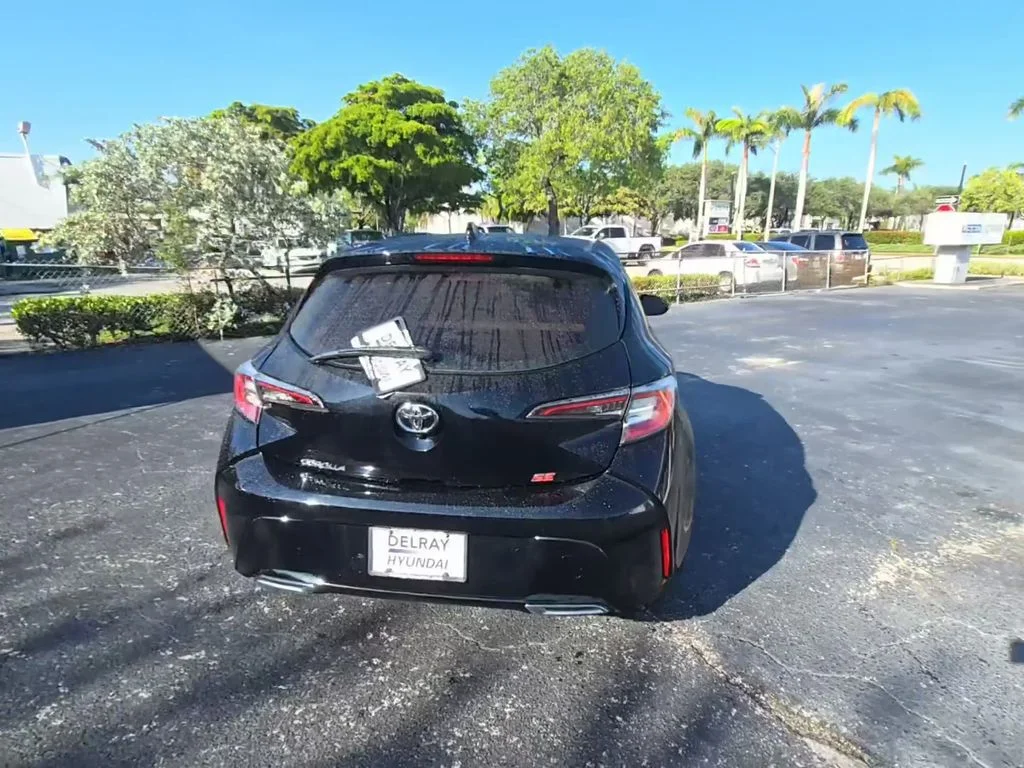 Used 2019 Midnight Black Metallic Toyota SE image 4