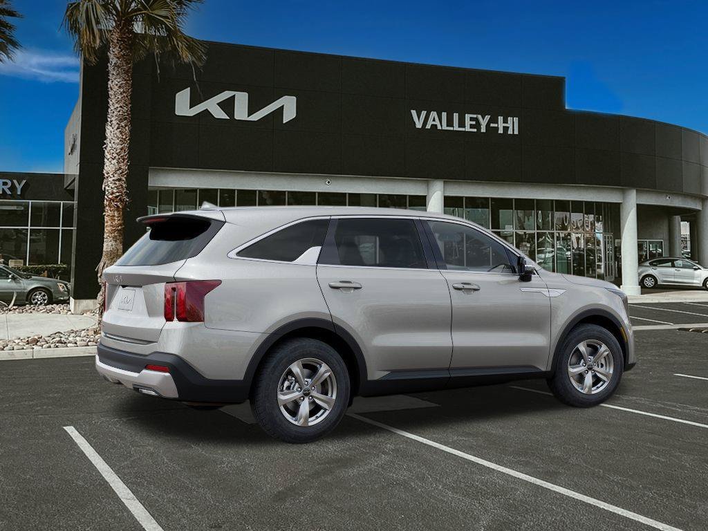New 2026 Ivory Silver Kia LX image 6