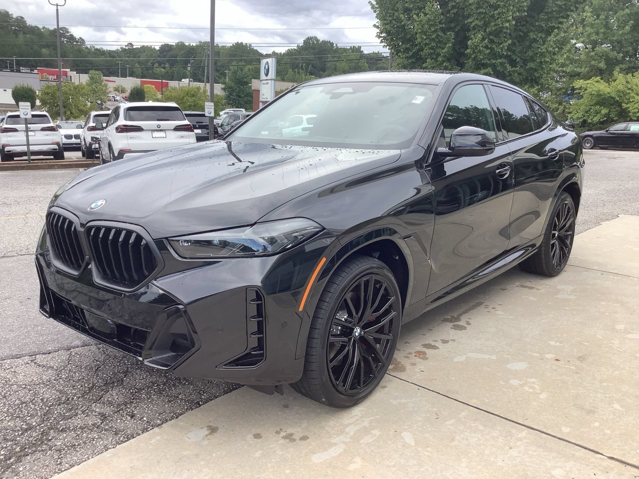 New 2027 Black Sapphire Metallic BMW xDrive40i image 4
