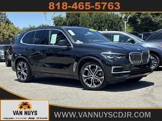 Used 2023 Black BMW xDrive40i image 1