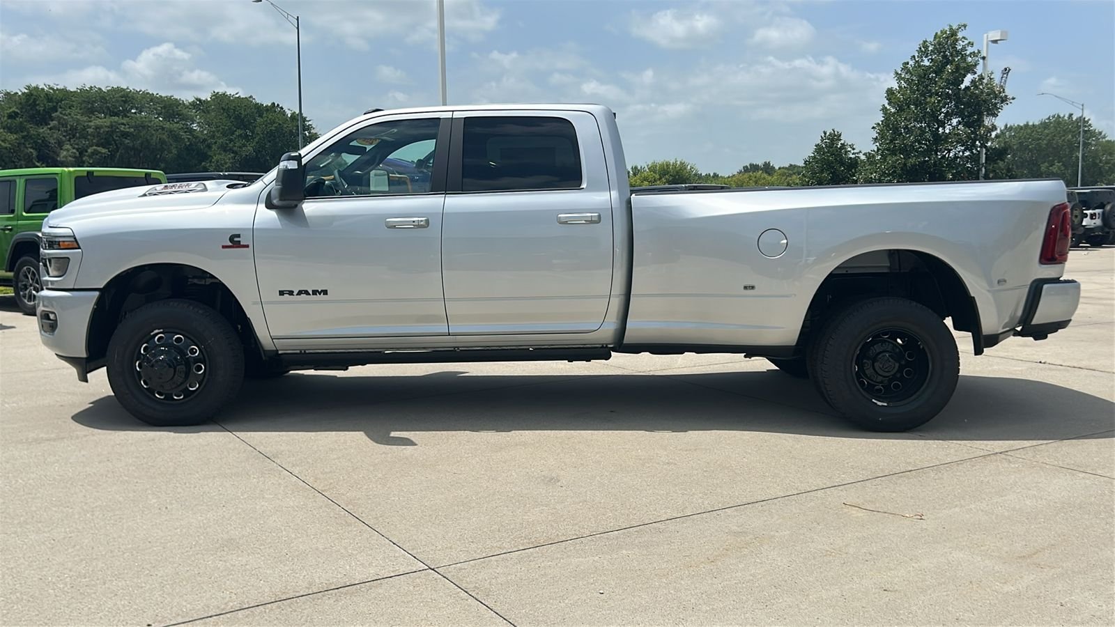 New 2026 Silver-Zynith Exterior Paint RAM Laramie image 7