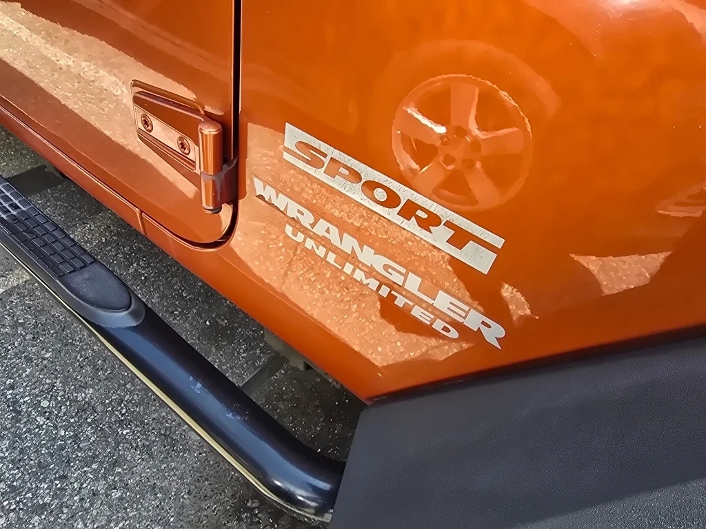 Used 2011 Mango Tango Pearlcoat Jeep Sport image 10