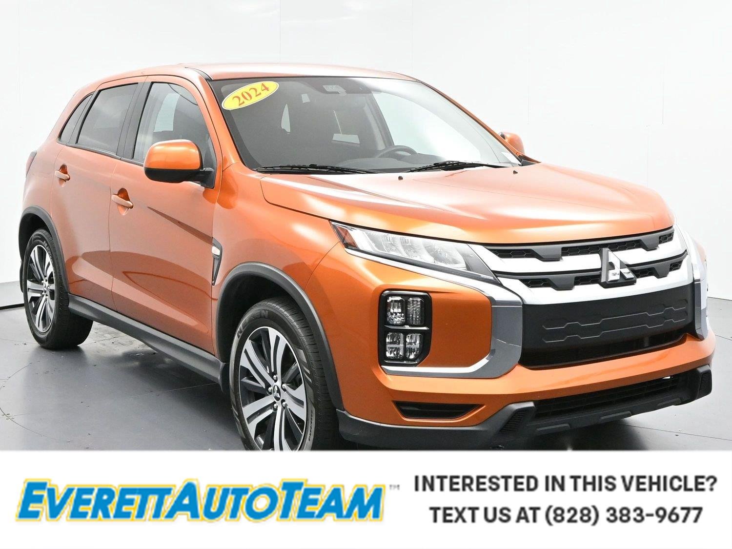 Used 2024 Sunshine Orange Metallic Mitsubishi ES image 1