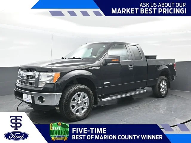 Used 2014 Tuxedo Black Metallic Ford XLT image 1