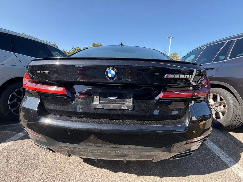 Used 2022 Black Sapphire Metallic BMW M550i xDrive image 4