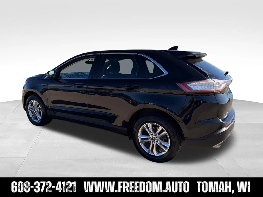 Used 2016 Black Ford SEL image 4