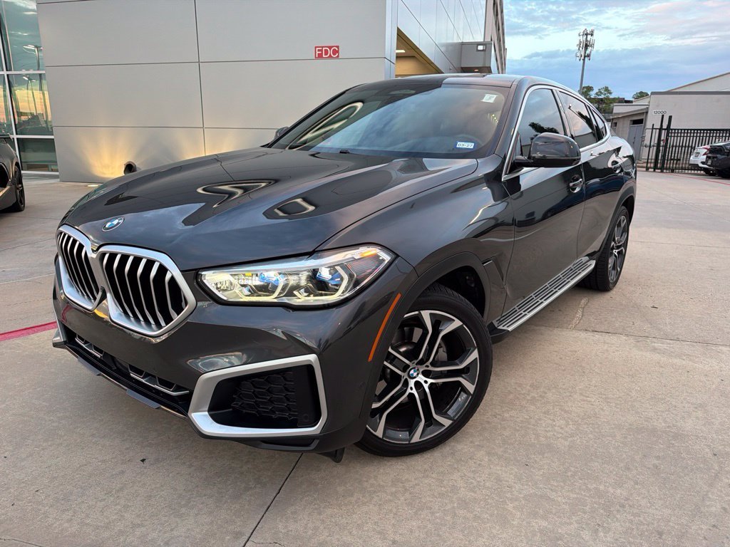 Used 2022 Dark Graphite BMW xDrive40i image 1