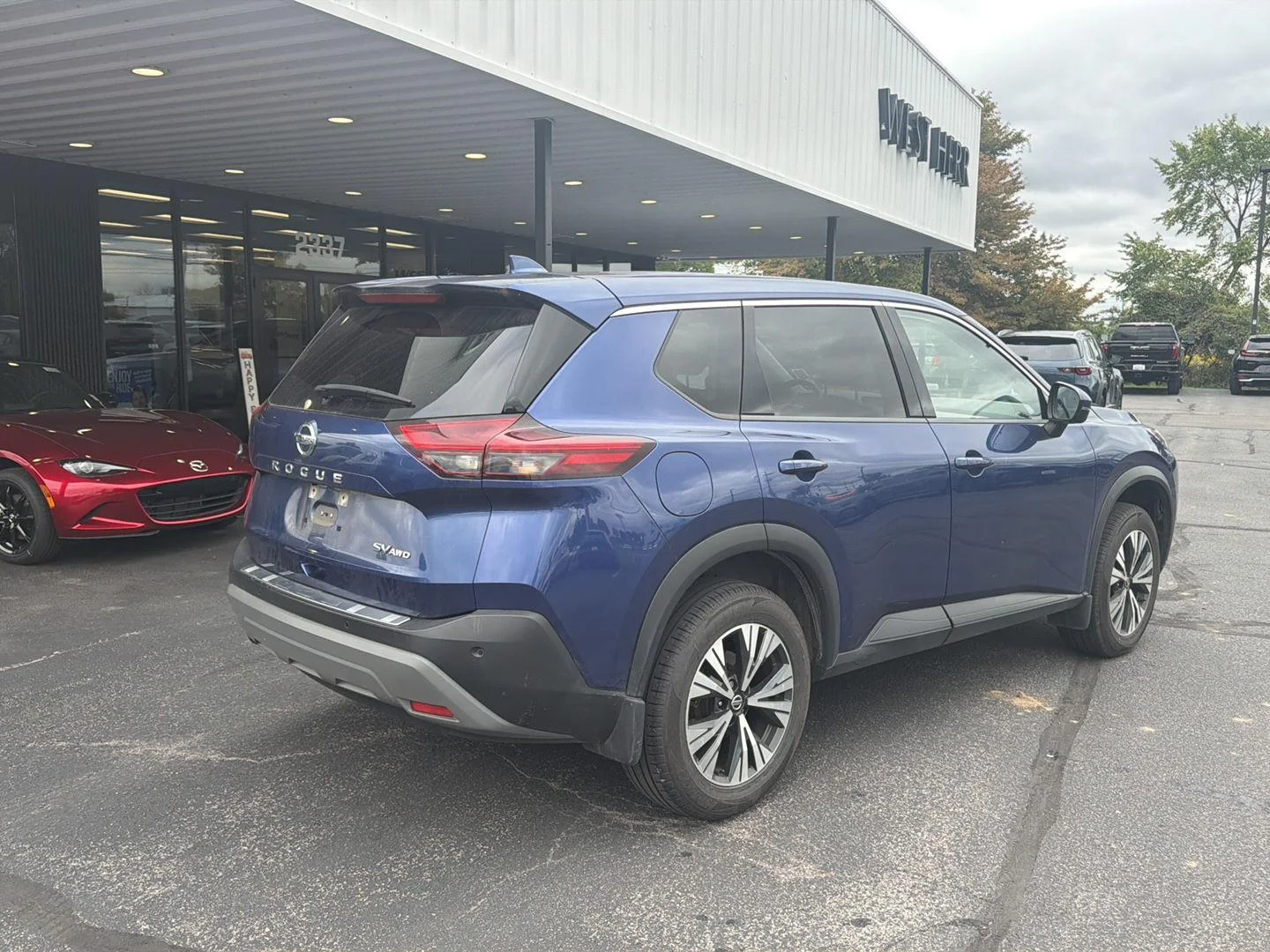 Used 2021 Caspian Blue Metallic Nissan SV image 8