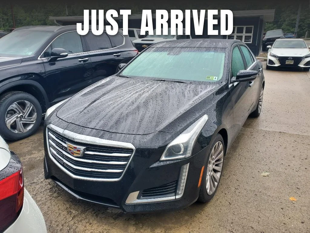 Used 2016 Black Raven Cadillac Luxury Collection AWD image 1