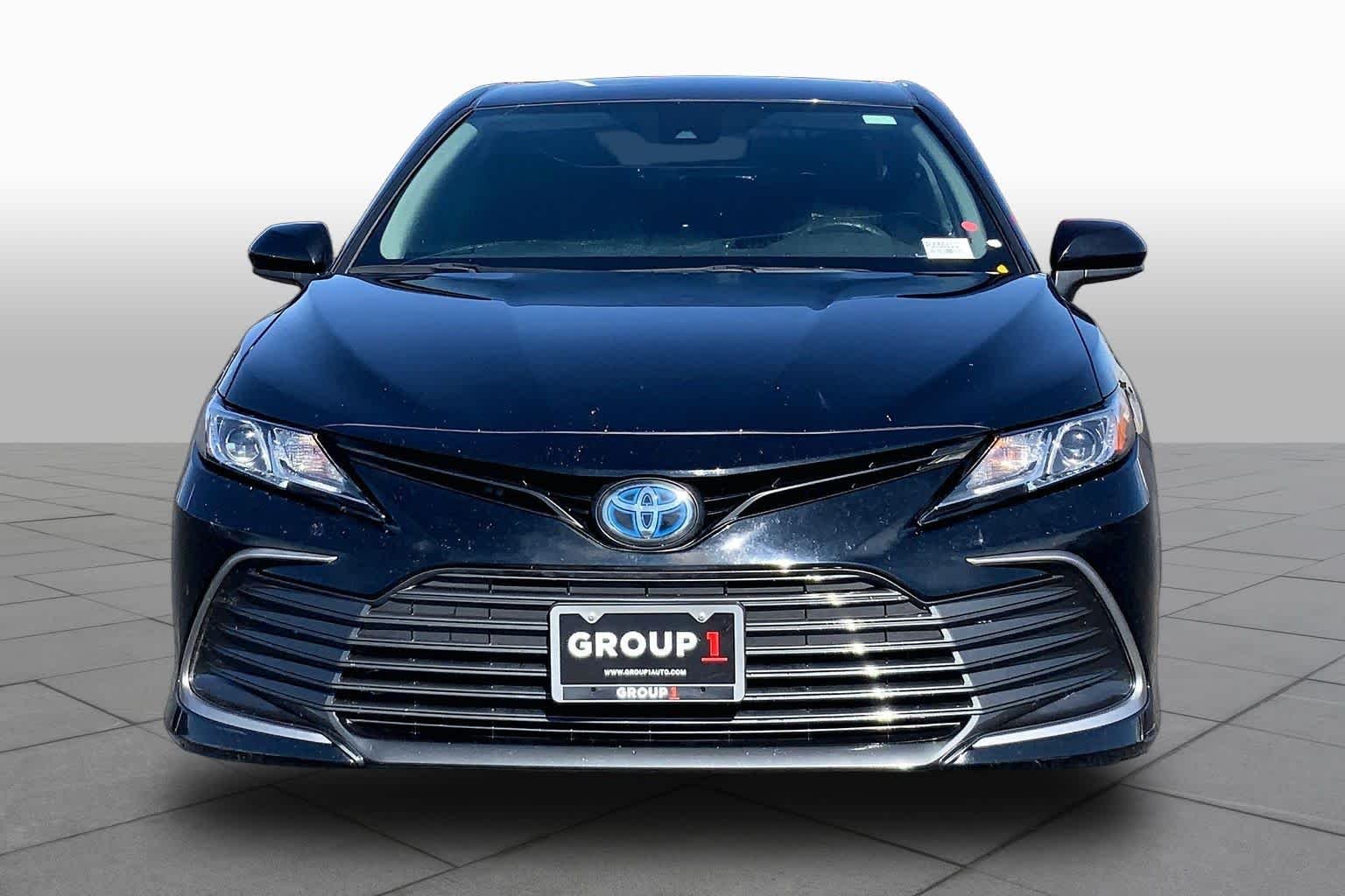 Used 2023 Midnight Black Metallic Toyota Hybrid LE image 4