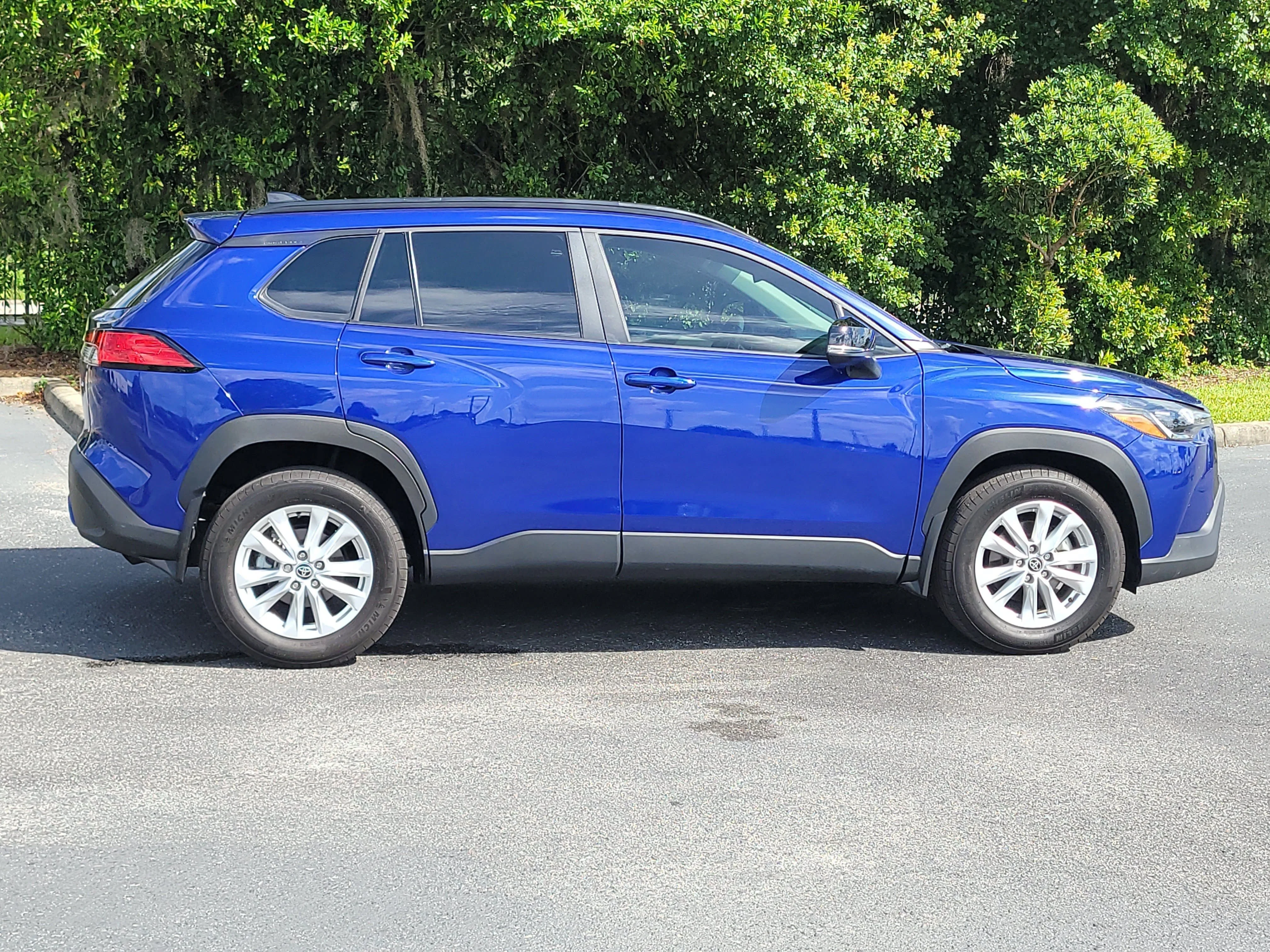 Used 2025 Blue Crush Metallic Toyota LE image 7