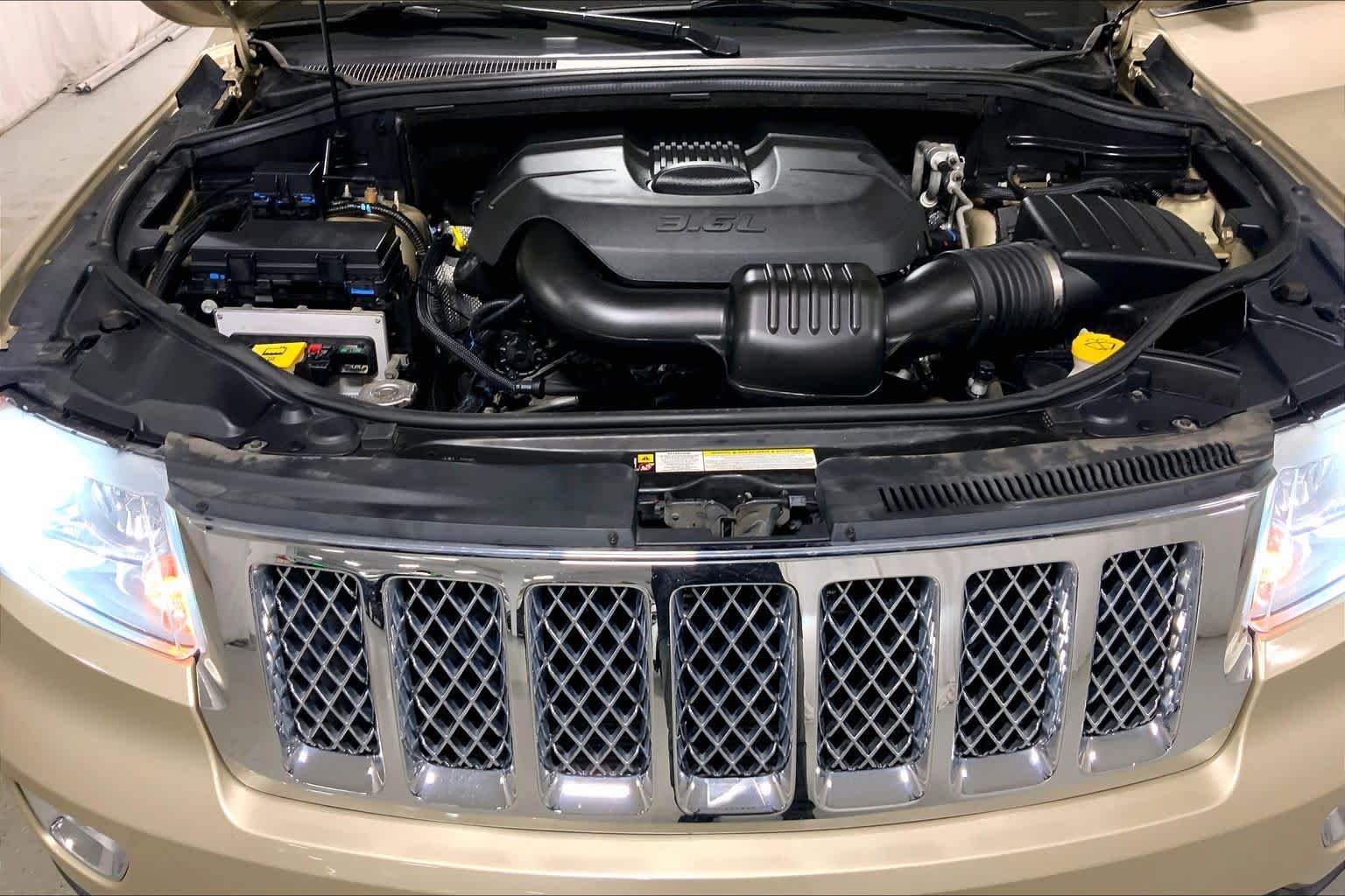 Used 2011 White Gold Jeep Overland Summit image 30