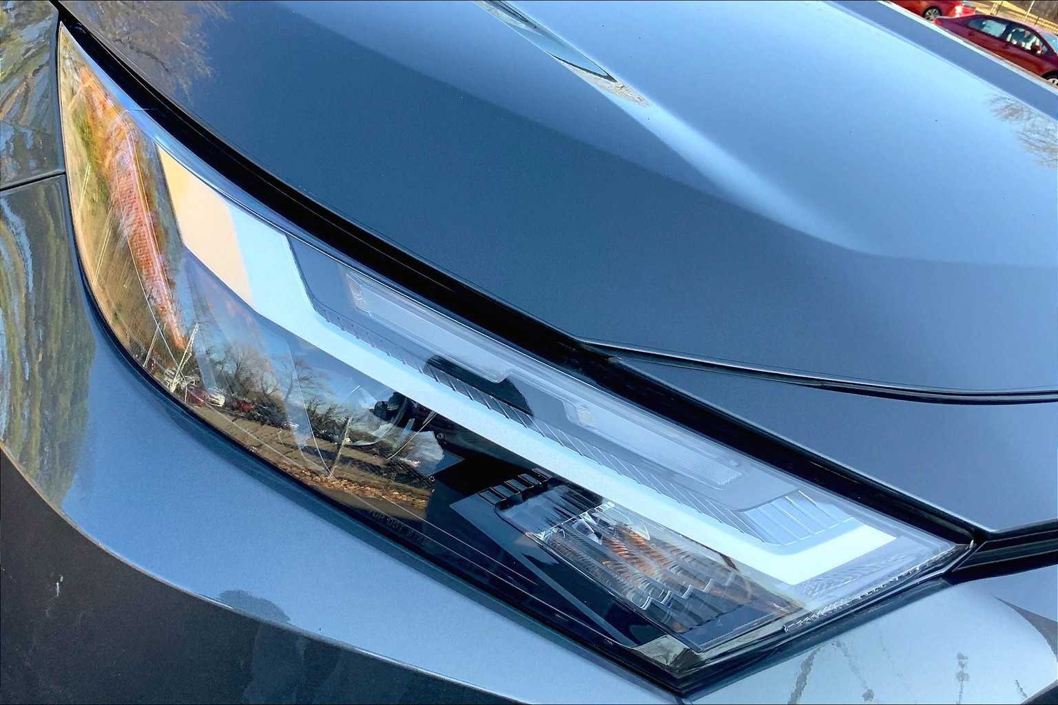 Used 2023 Magnetic Gray Metallic Toyota LE image 24