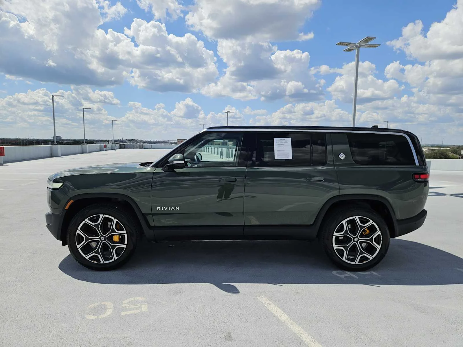 Used 2023 Forest Green Rivian Adventure image 4