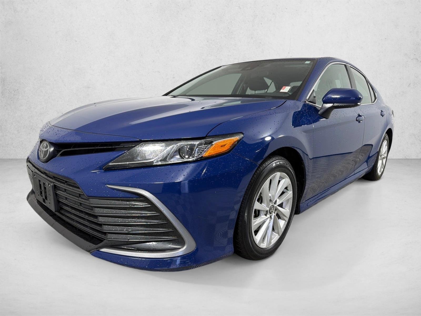 Used 2024 Reservoir Blue Toyota LE image 7