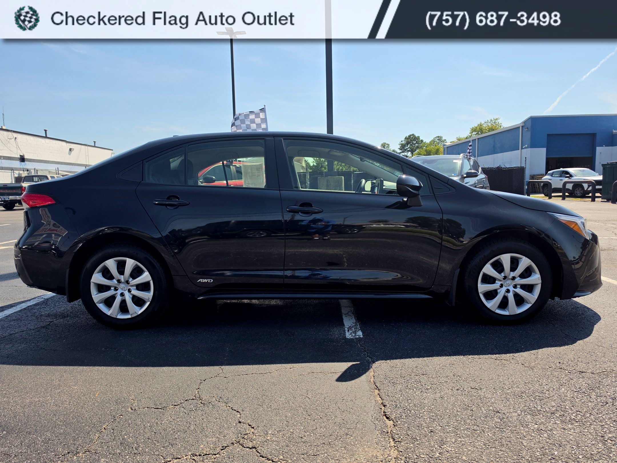 Used 2023 Midnight Black Metallic Toyota LE image 6