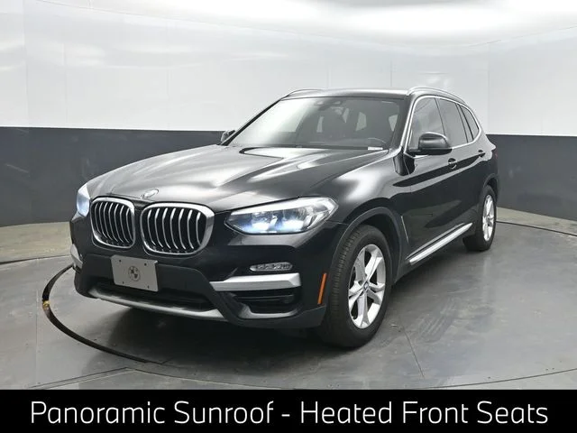 Used 2019 Black BMW sDrive30i image 1