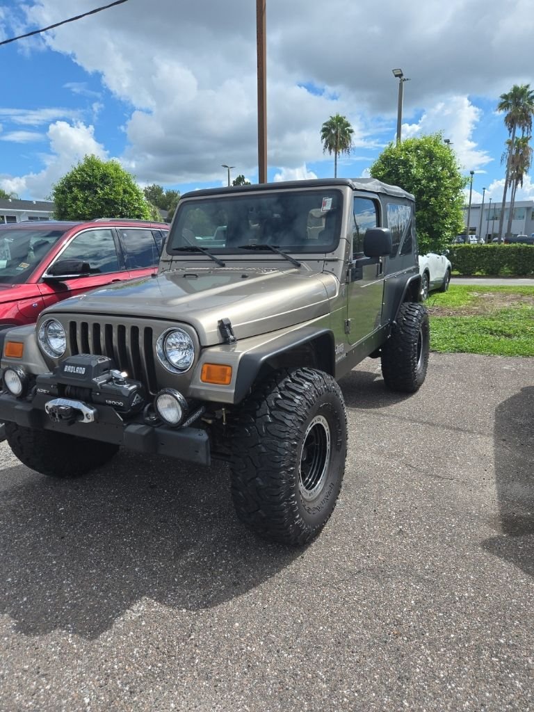 Used 2004 Beige Jeep Unlimited image 1