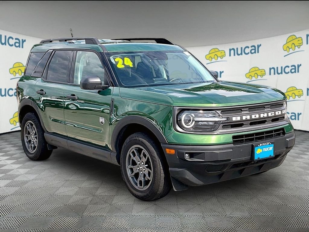 Used 2024 Eruption Green Metallic Ford Big Bend image 1