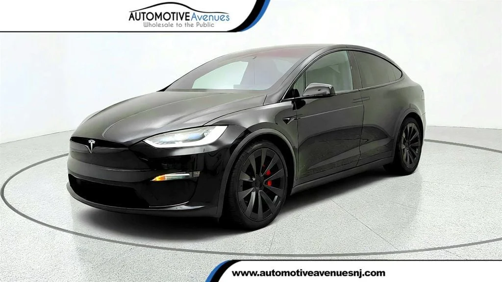 Used 2024 Solid Black Tesla Plaid AWD w/ 22