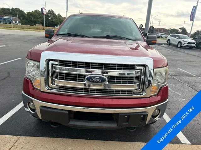 Used 2013 Ruby Red Metallic Ford XLT image 2