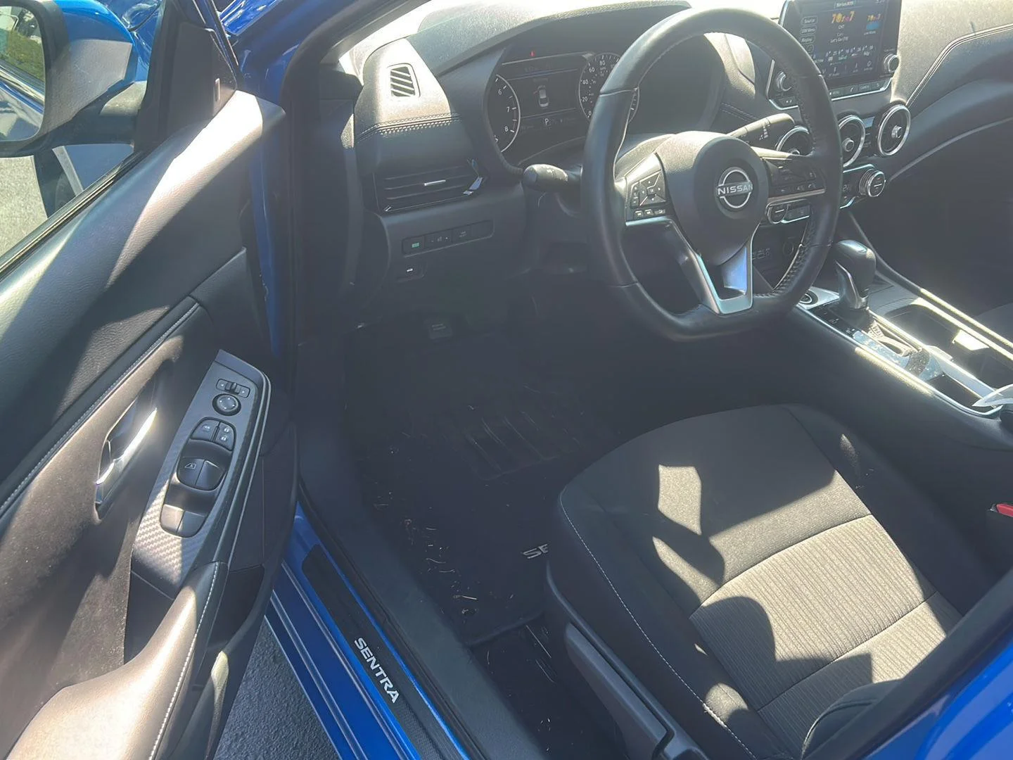 Used 2024 Electric Blue Metallic Nissan SV image 6