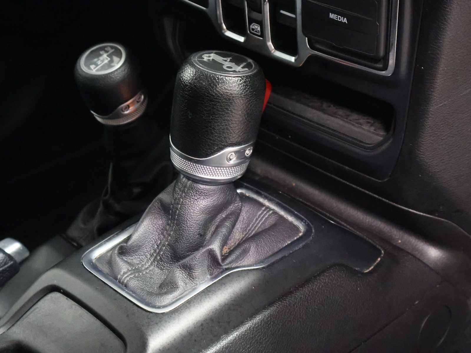 Used 2018 Granite Crystal Metallic Clearcoat Jeep Sport S image 18