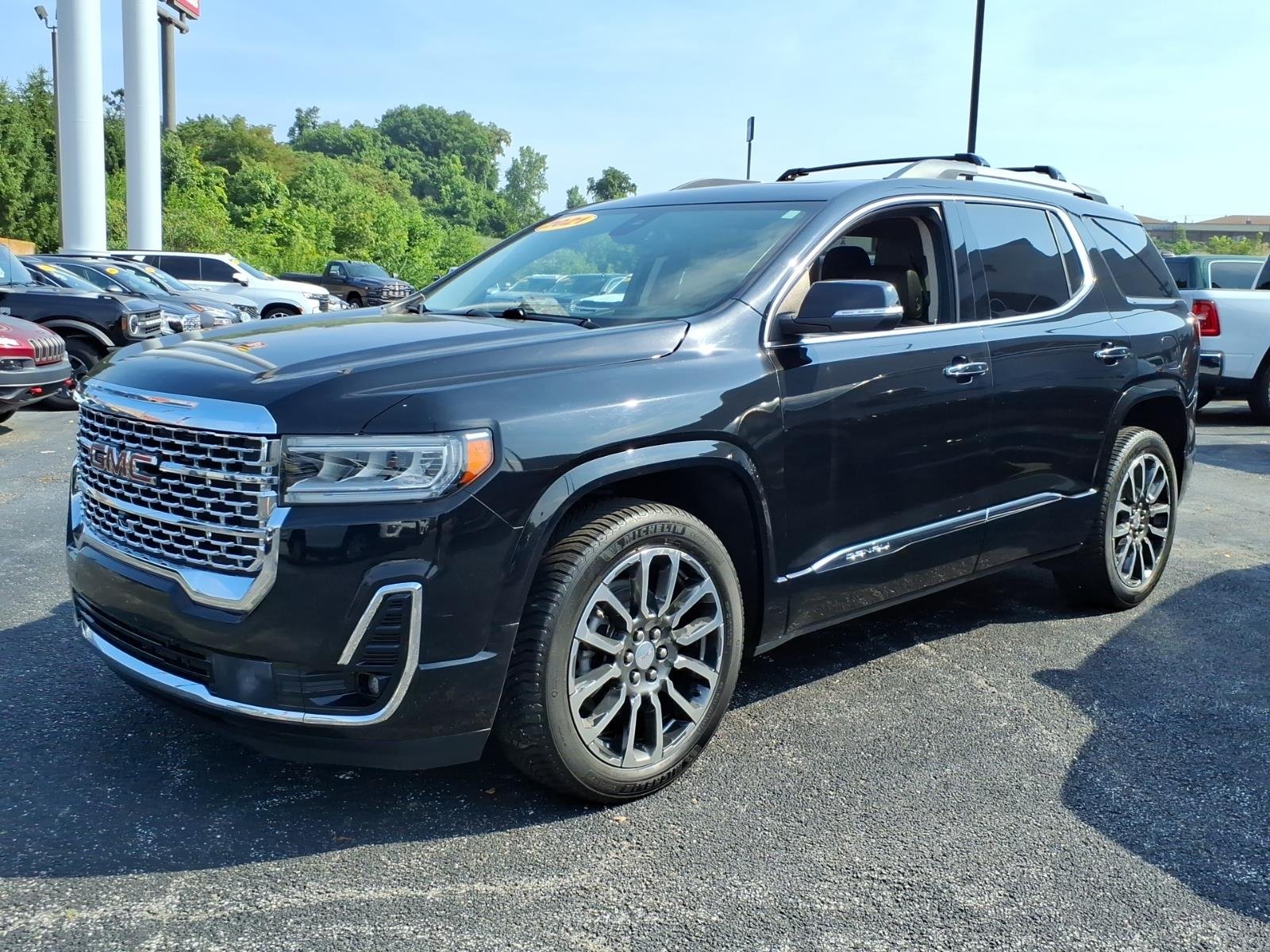 Used 2021 Ebony Twilight Metallic GMC Denali image 1