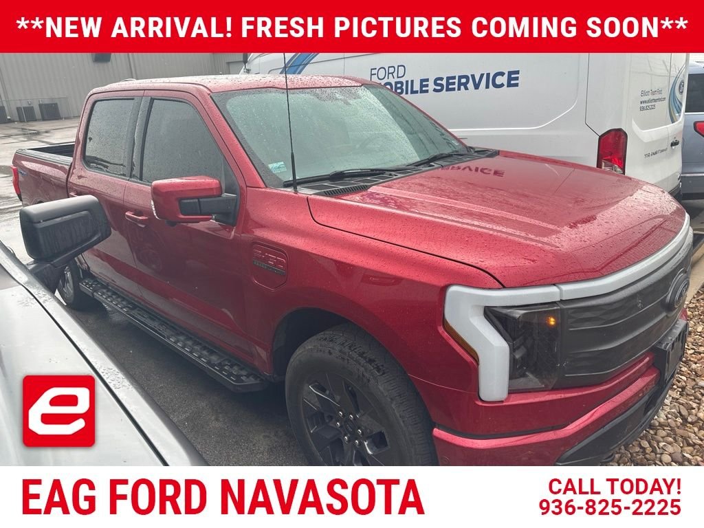 Used 2022 Rapid Red Metallic Tinted Clearcoat Ford Lariat image 1