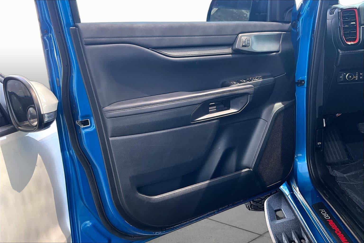 Used 2024 Velocity Blue Metallic Ford Raptor image 22