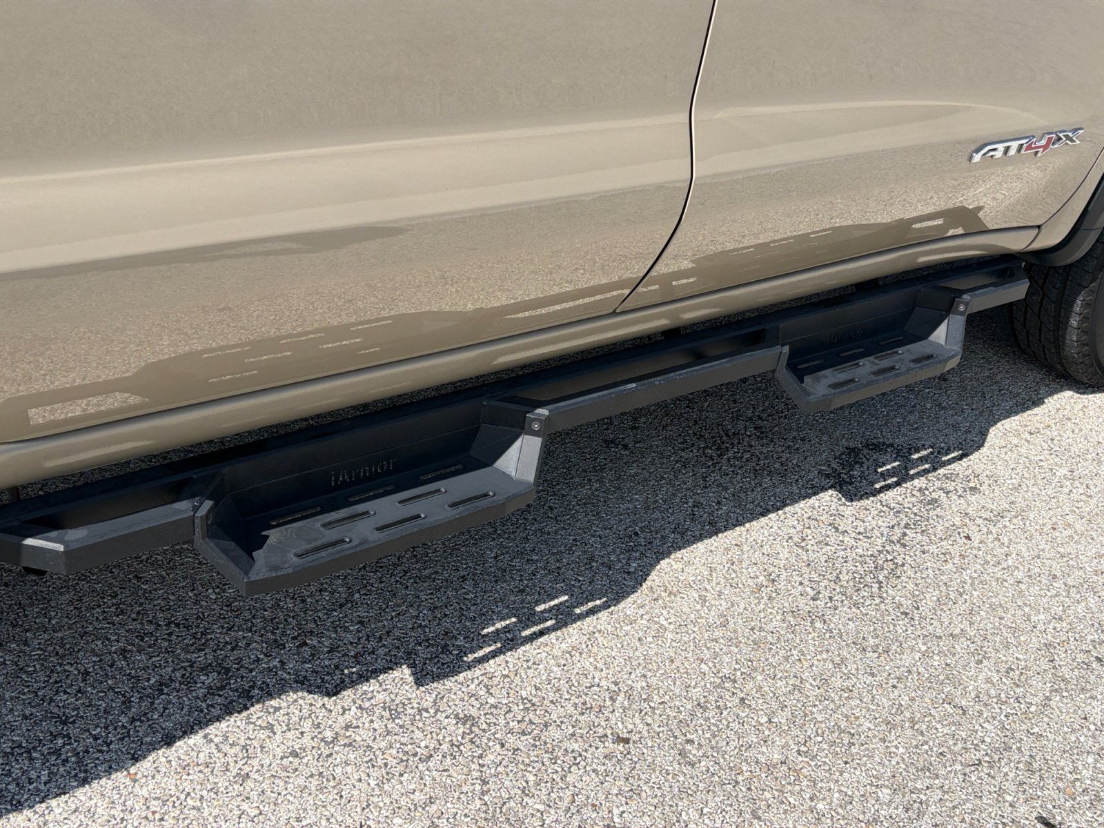 Used 2023 Desert Sand Metallic GMC AT4X image 28