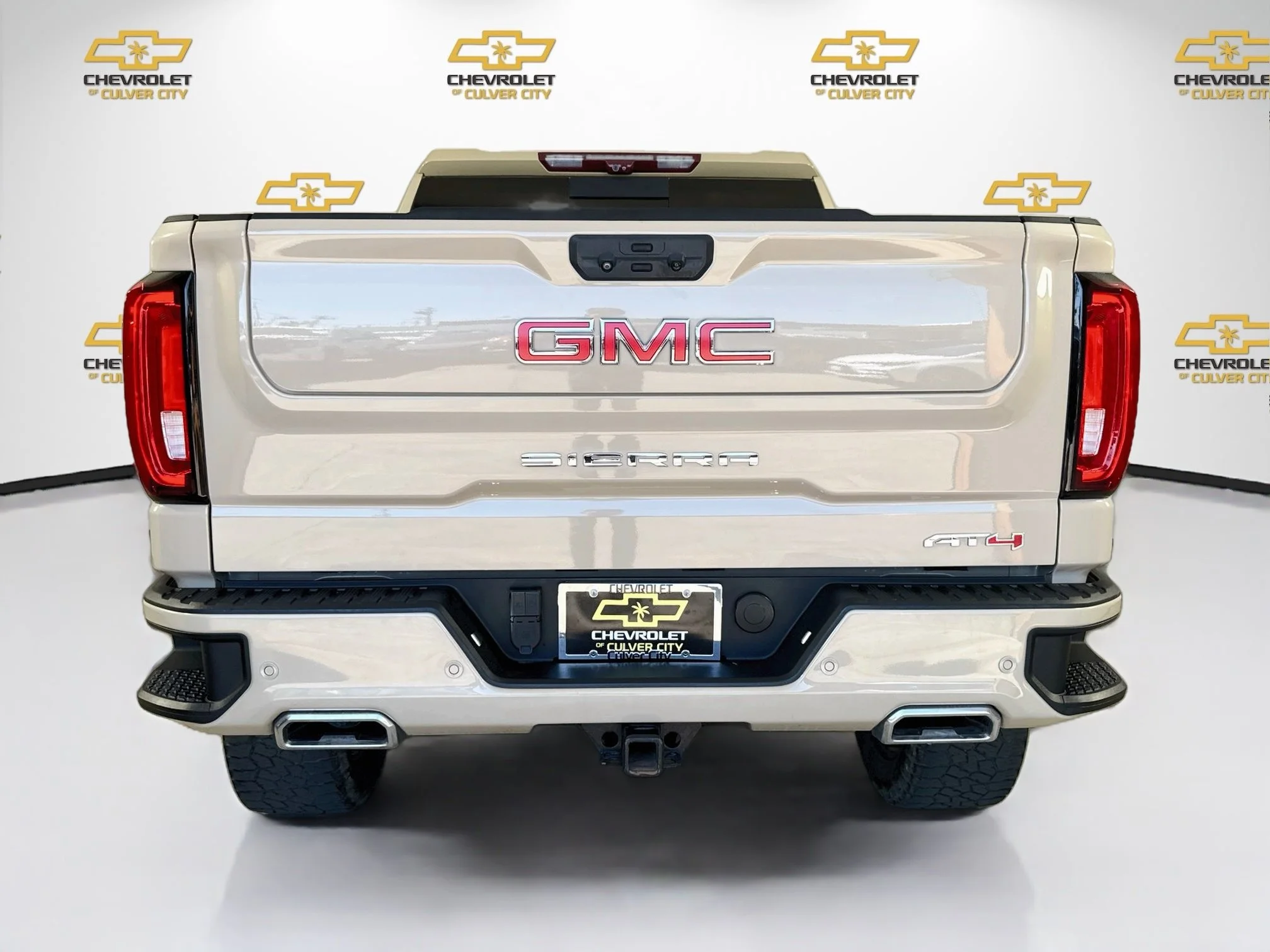 Used 2023 DESERT SAND METALLIC GMC AT4 image 8