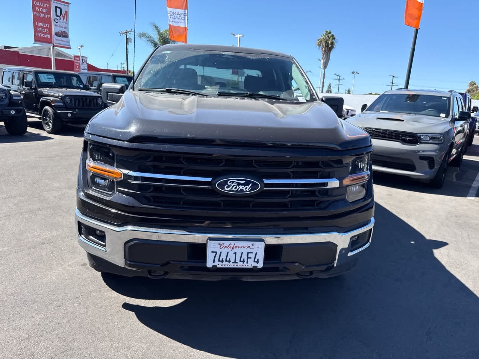 Used 2025 Agate Black Metallic Ford XLT image 4