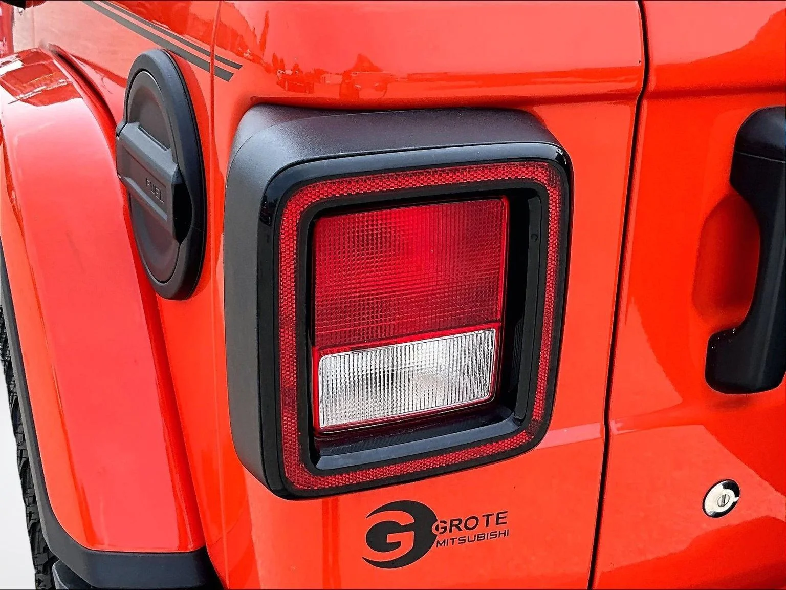 Used 2018 Orange Jeep Unlimited Sahara image 31