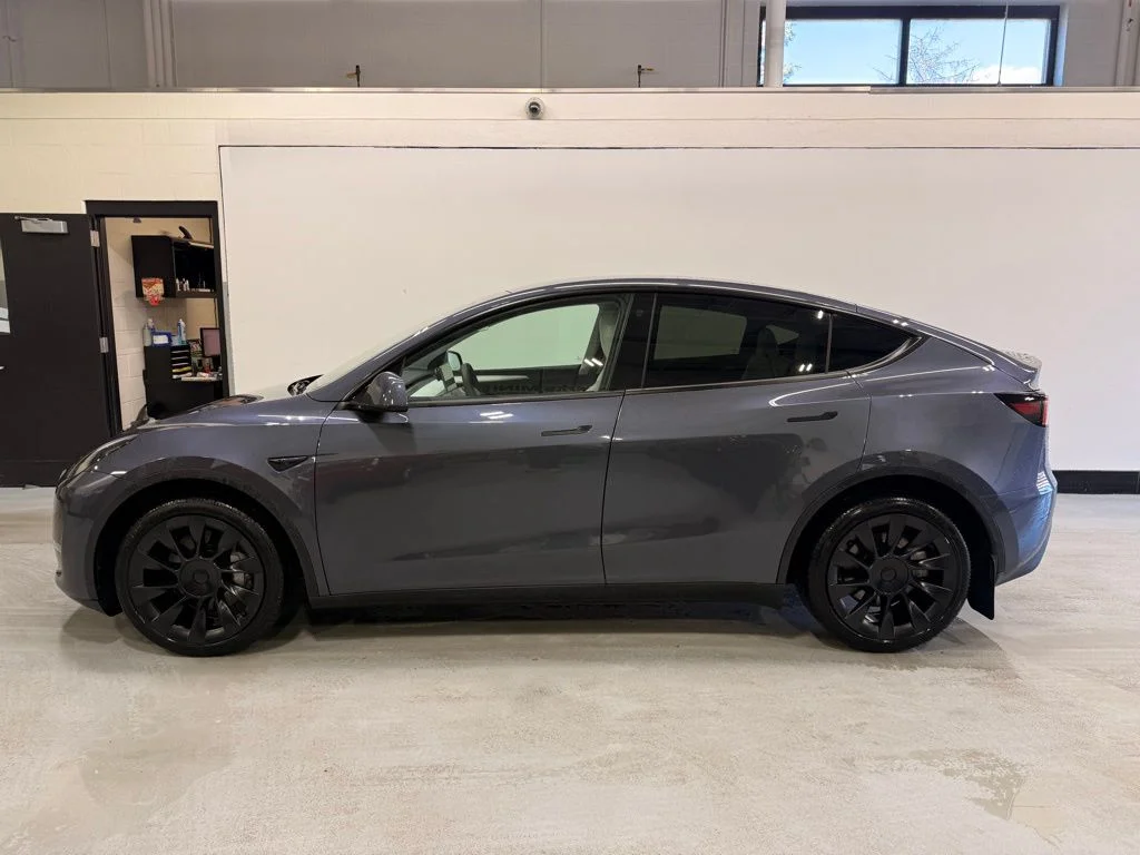 Used 2023 Tesla Model Y Long Range with VIN 7SAYGDEE3PF691775 for sale in Golden Valley, MN