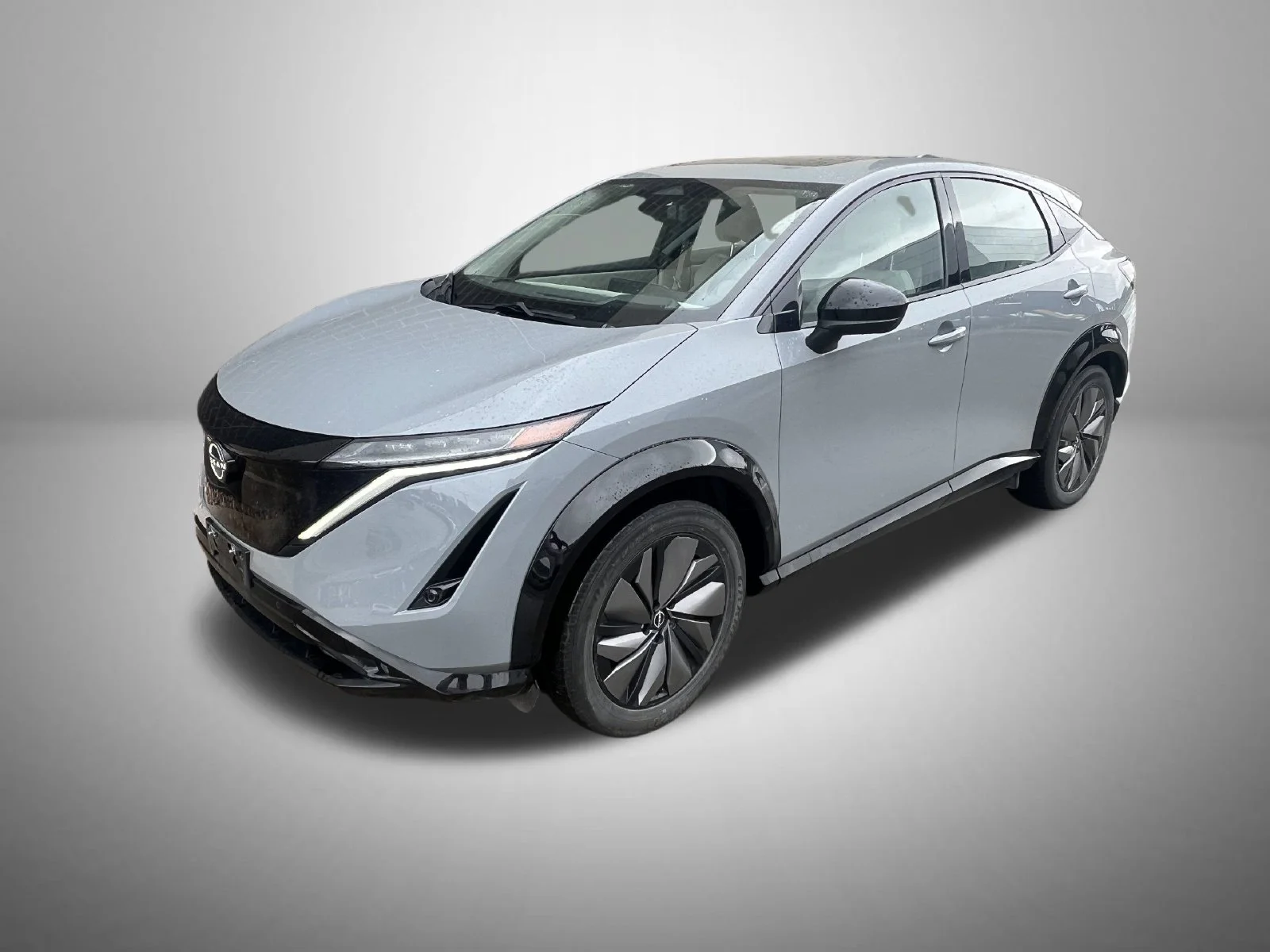 Certified Used 2024 Gray Nissan EVOLVE+ e-4ORCE image 1