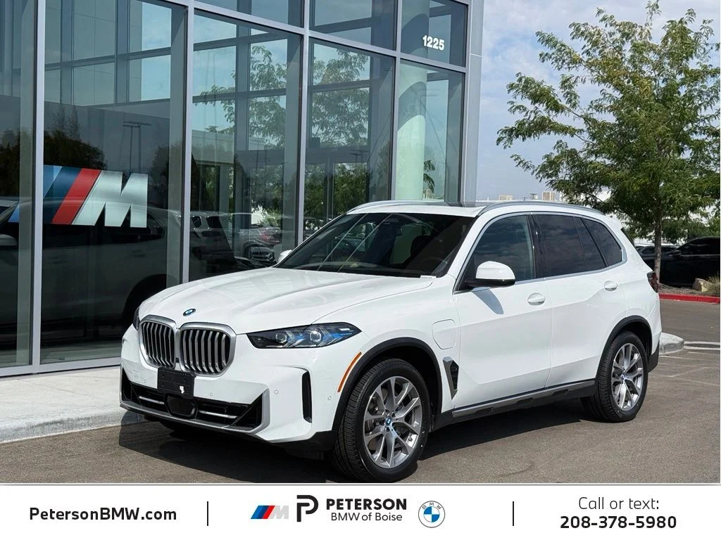 Used 2024 White BMW xDrive50e image 1