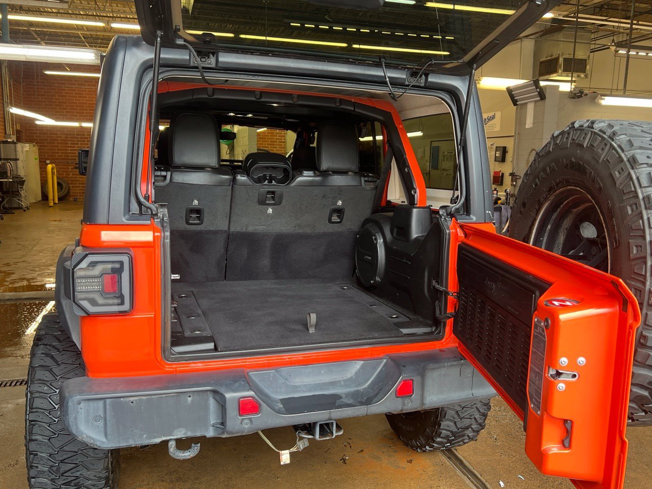 Used 2020 Orange Jeep Unlimited Sahara image 14
