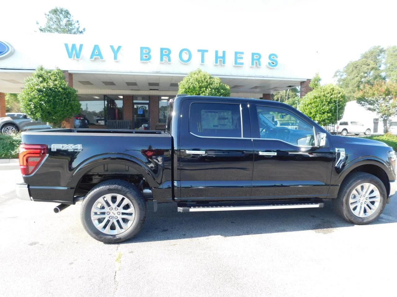 New 2026 Agate Black Metallic Ford Lariat® image 1