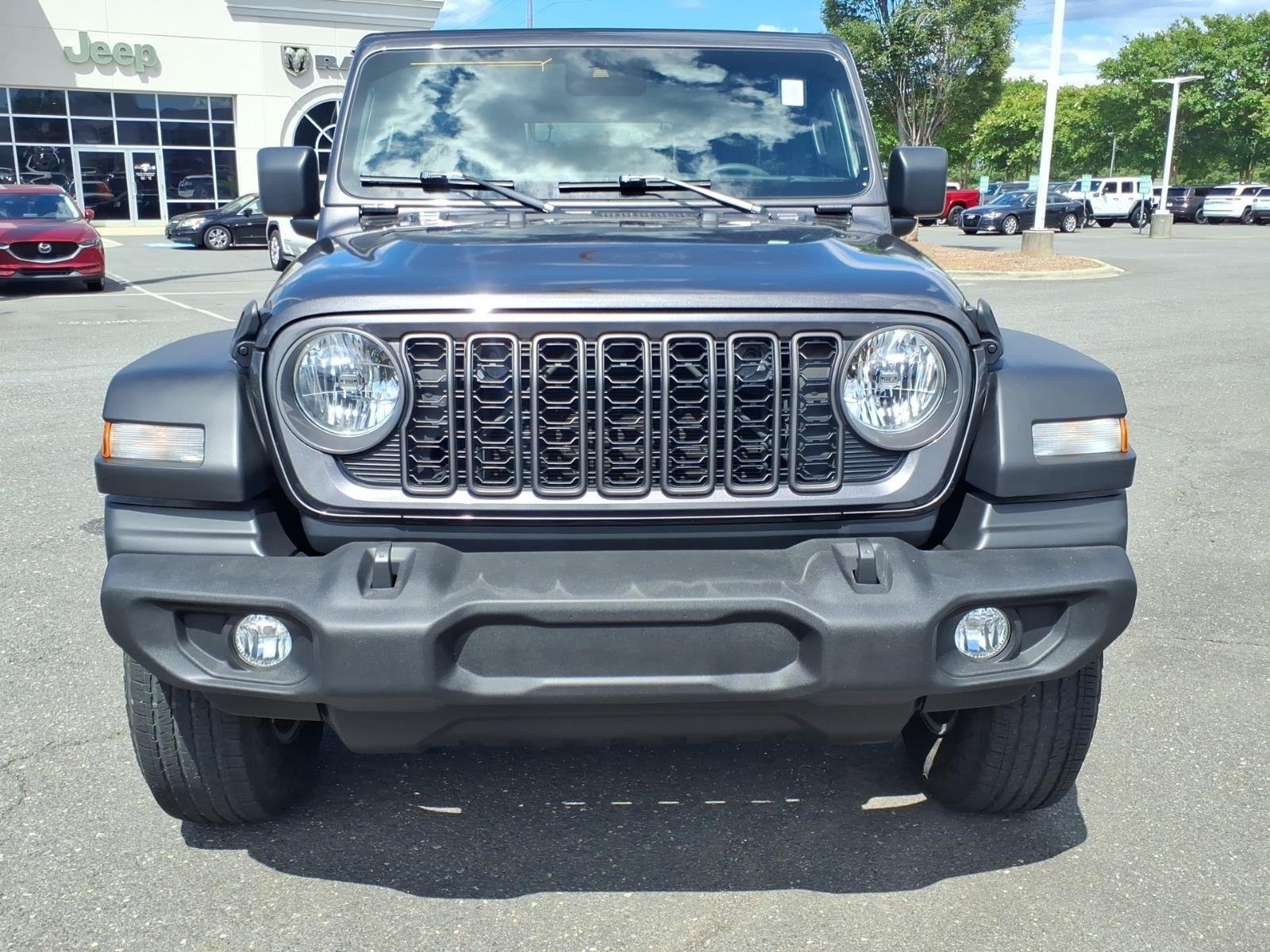 Used 2024 Granite Crystal Metallic Clearcoat Jeep Sport S image 14