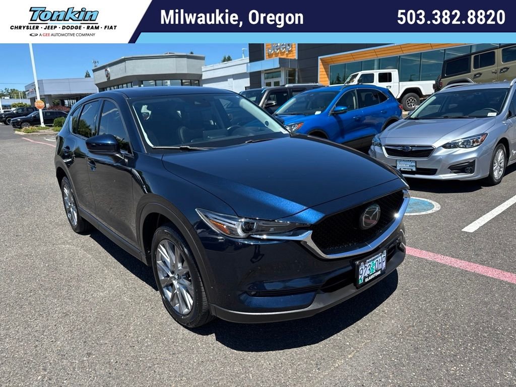 Used 2021 Deep Crystal Blue Mica Mazda Grand Touring image 1