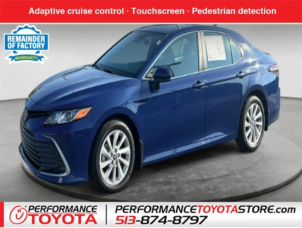 Used 2024 Reservoir Blue Toyota LE image 1